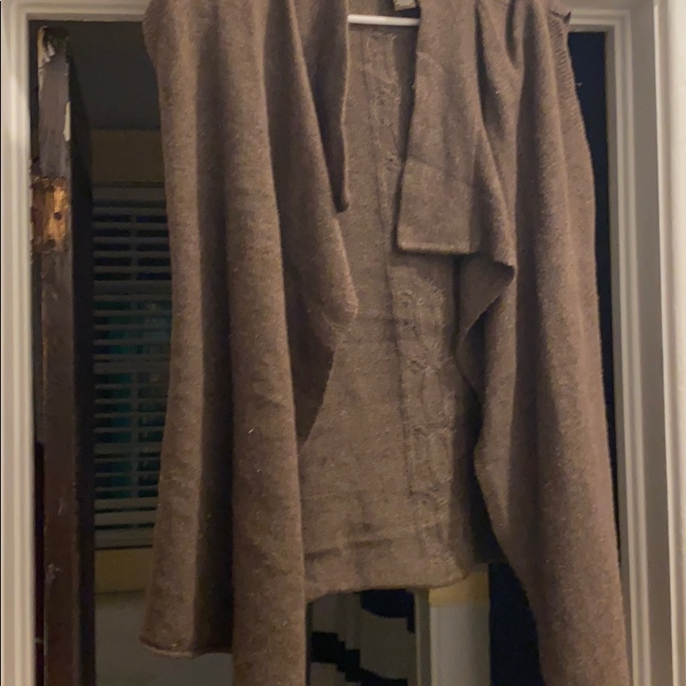 A brown sweater vest